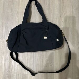 Black Crossbody Bag with Gold Accents